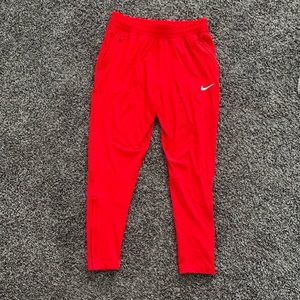 Red Nike joggers! Perfect condition